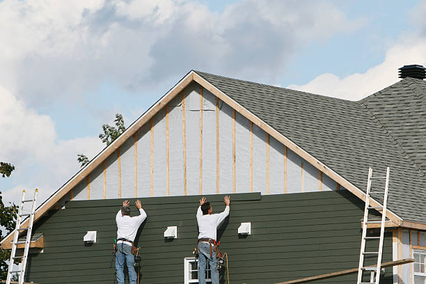 Professional Storm Damage Siding Repair technician working in Diggs, VA